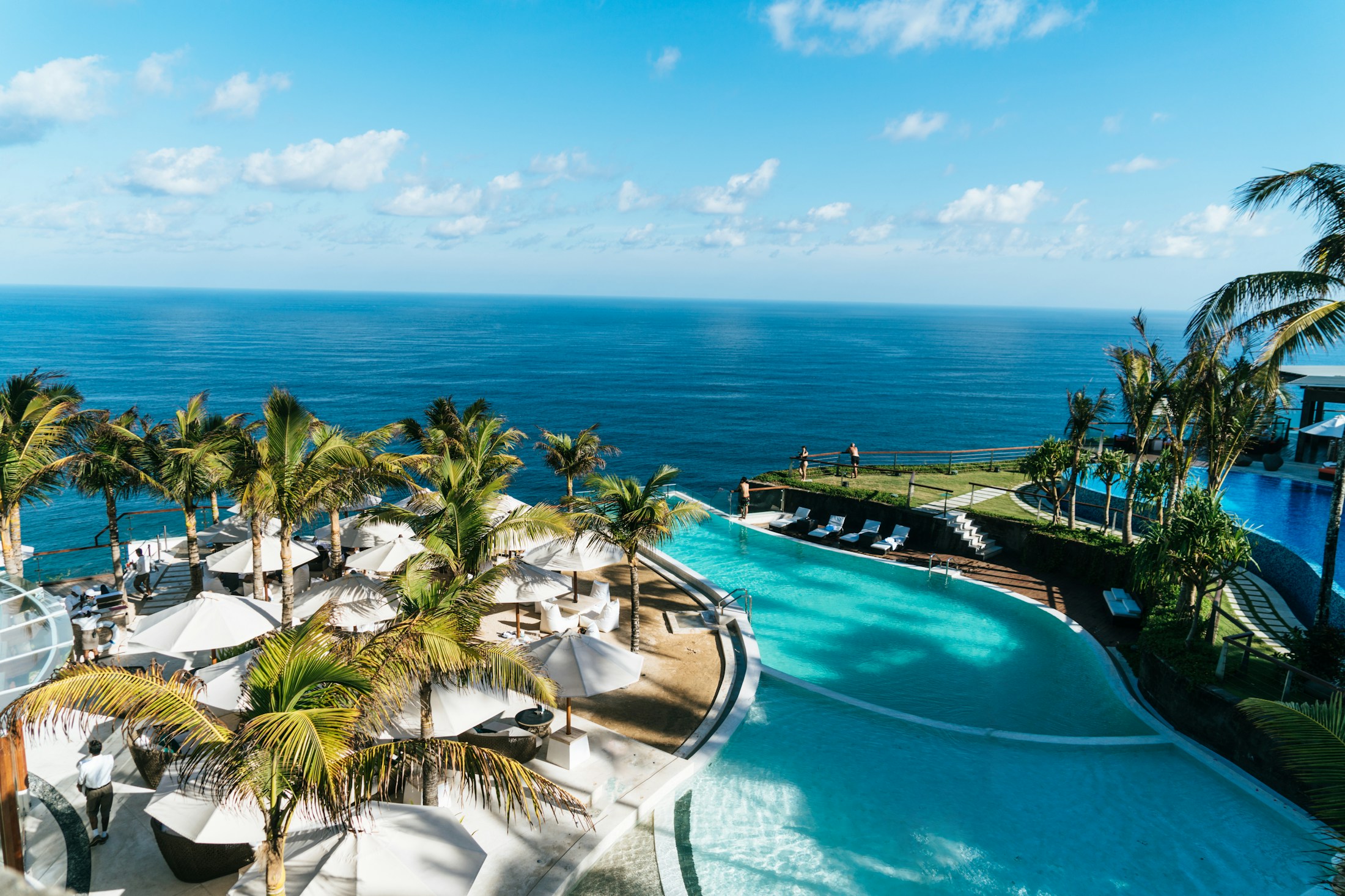 Quiet pool framed by tropical gardens